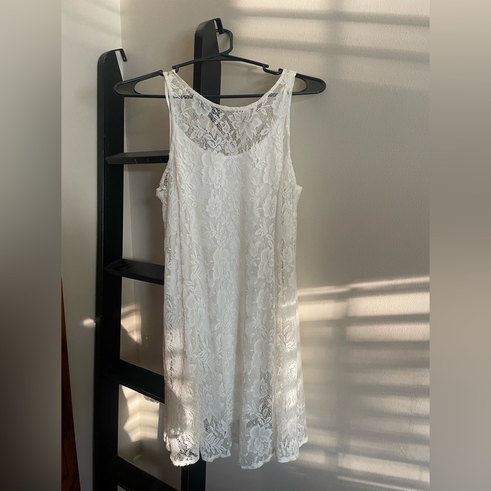 White dainty lace dress with white shirt dress underneath!
